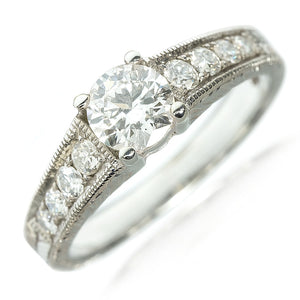 Round brilliant cut solitaire diamond engagement ring