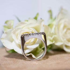 Side profile of white gold diamond ring