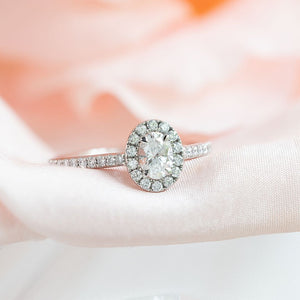 Oval Cut diamond halo engagement ring