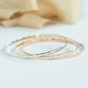White, yellow and rose gold bangles