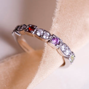 4 birthstone heirloom ring showing amethyst and ruby