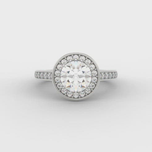 0.50ct Round Brilliant Cut Diamond Centre Stone. .30ct Round Brilliant cut diamonds on the halo- .80ct in total.