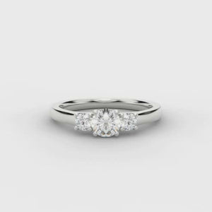 Three Stone Engagement with plain shoulders.  The centre stone weighs 0.40ct and the side stones weigh 0.20ct each.  This gives a combined total diamond carat weight for this trilogy ring of 0.60ct. 