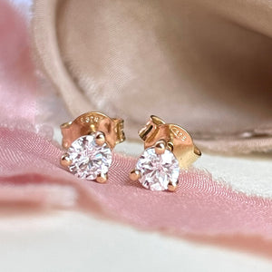 Diamond stud earrings in a 9ct yellow gold 3 claw setting