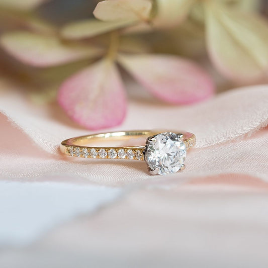 18ct Gold Solitaire Diamond Ring with Diamond Set Shoulders