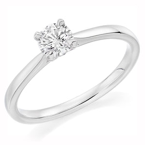 This Solitaire Engagement Ring has a 0.33ct Round Brilliant Cut centre diamond in a four claw setting with plain shoulders