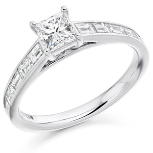 0.50ct Princess Cut Diamond Solitaire Engagement Ring with Baguette Cut Diamond Shoulder  Centre Diamond Weight: 0.50ct  Centre Stone Cut: Princess Cut  Diamond Cut on Shoulders: Baguette Cut  Diamond Weight on Shoulders: 0.55ct  Total Diamond Weight: 1.05ct  Available in Yellow Gold, Rose Gold, White Gold and Platinum.  This ring is also available with Lab Grown Diamonds - contact us for further information.