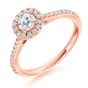 0.33ct Round Brilliant Cut Diamond Halo Engagement ring with Diamond Set Shoulders  Centre Stone: 0.33ct  Centre Stone Cut: Round Brilliant Cut  Diamond Weight on Halo/Shoulders: 0.30ct  Total Diamond Weight: 0.63ct  Note:  This ring is made to order and lead time is 6 weeks.  This ring is also available with Lab Grown Diamonds - contact us for further information.