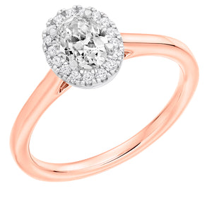 0.33ct Oval Cut Diamond Halo with Plain Shoulders Engagement Ring  Centre Diamond Weight: 0.33ct  Centre Stone Cut: Oval Cut   Diamond Weight on Halo: 0.15ct  Diamond Cut on Halo: Round Brilliant  Total Diamond Weight: 0.48ct  Note:  This ring is made to order and lead time is 6 weeks.