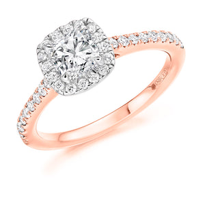 0.70ct Cushion Cut Diamond Engagement ring with Halo and Diamond set Shoulders  Centre Diamond Weight: 0.75ct  Centre Stone Cut: Cushion Cut  Diamond Cut on Shoulders: Round Brilliant Cut  Diamond Weight on Halo/Shoulders: 0.40ct  Total Diamond Weight: 1.15ct  This ring is also available with Lab Grown Diamonds - contact us for further information.