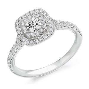 0.33ct Double Halo Engagement ring with Split Diamond Set Shoulders  Centre Diamond Weight: 0.33ct  Centre Stone Cut: Cushion Cut   Diamond Weight on Halo/Shoulders: 0.50ct  Diamond Cut on Shoulders: Round Brilliant Cut  Total Diamond Weight: 0.83ct  This ring is also available with Lab Grown Diamonds - contact us for further information.  Note:  This ring is made to order and lead time is 6 weeks.