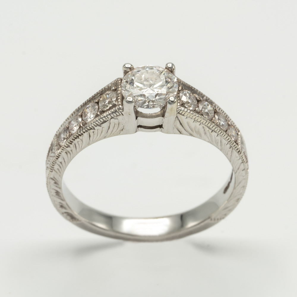 18ct White Gold Solitaire Diamond Ring with a round brilliant cut diamond 0.60ct rbc E/SI1 - GIA 6262996825Graduated Diamond Set Shoulders weighing 0.36ct
