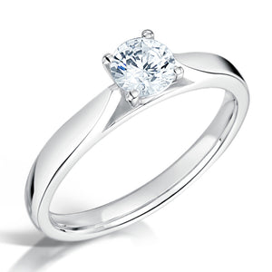 1.00ct Round Centre Stone.  Solitaire diamond ring in a four claw setting. 