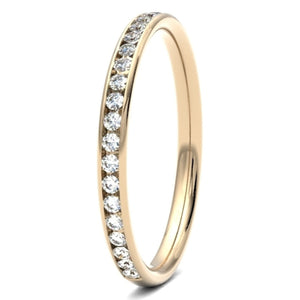 Round Brilliant Cut Chanel Set Wedding ring.  Diamond coverage 50%  Total Diamond Weight 0.20ct.