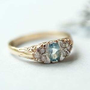 Vintage style aquamarine and diamond ring