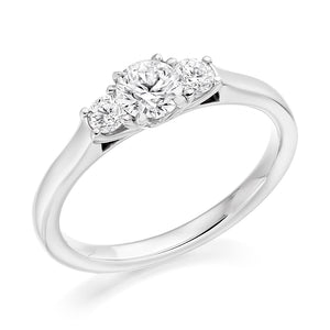 Three Stone Engagement with plain shoulders.  The centre stone weighs 0.40ct and the side stones weigh 0.20ct each.  This gives a combined total diamond carat weight for this trilogy ring of 0.60ct. 