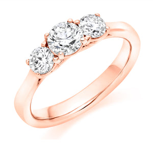 Three Stone Round Brilliant Cut Diamond Ring with Plain Shoulders   Centre stone 0.50ct  Sides 2 x 0.25ct  All stones are Round Brilliant Cut - Claw set.