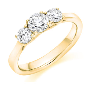 Three Stone Round Brilliant Cut Diamond Ring with Plain Shoulders   Centre stone 0.50ct  Sides 2 x 0.25ct  All stones are Round Brilliant Cut - Claw set.