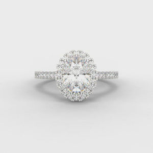 0.40ct Oval Cut Diamond Halo Surround Engagement Ring with Diamond Shoulders  Centre Diamond Weight: 0.40ct  Centre Stone Cut: Oval Cut  Diamond Weight on Halo/Shoulders: 0.35ct  Total Diamond Weight: 0.75ct  This ring is also available with Lab Grown Diamonds - contact us for further information.  Note:  This ring is made to order and lead time is 6 weeks.
