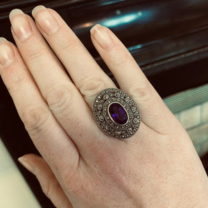 Amethyst Marcasite ring shown on models hand