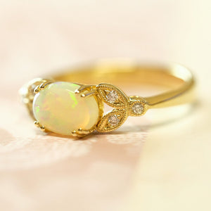 Opal and diamond gold ring