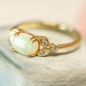 Opal and diamond leaf ring