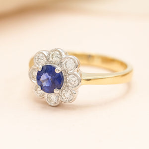 Vibrant blue sapphire and diamond vintage style ring